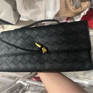 Elegant Black Woven Clutch
